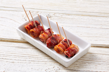 pinchos Bacon wrapped dates pintxos tapas from Spain foodの写真素材