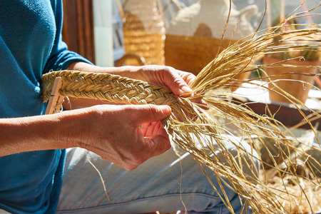 Esparto halfah grass crafts craftsman hands workingの写真素材
