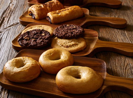 Pastries in a row Croissant Muffin Cookie Bagel and Neapolitan bakery