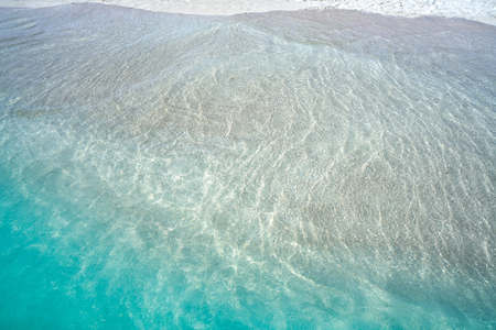 Caribbean tropical beach turquoise water texture in Mexicoの写真素材
