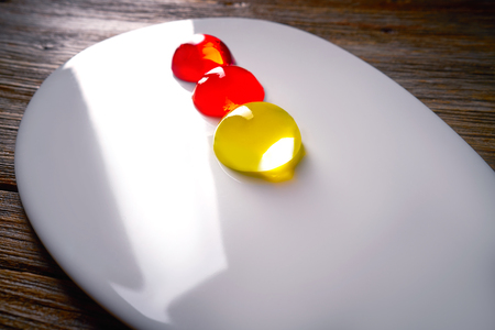 Molecular cuisine concept spheritions colorful in moodern oval plate jelly textureの写真素材