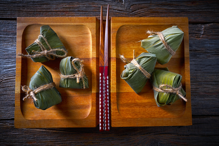 Zongzi Glutinous sticky Rice Dumplings recipe wrap with bamboo leaves asian foodの写真素材