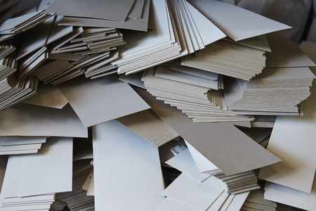 Cartoon paper ream from Cutting guillotine Shears machine in a printing factoryの写真素材