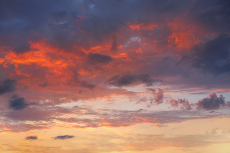 sunset sky in orange and blue blackground