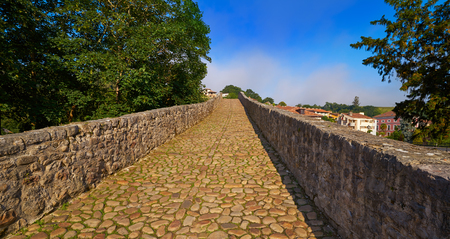 Cangas de Onis roman bridge on Sella river in Asturias of Spainの写真素材