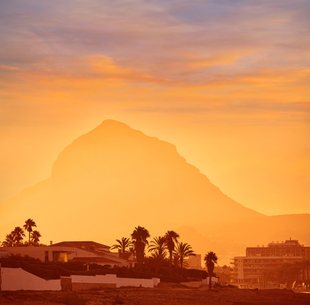 Javea also Xabia sunset beach and Montgo mountain at Alicante of Spainの写真素材