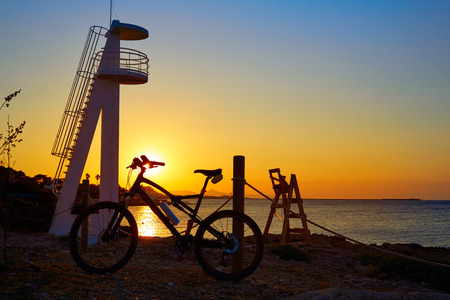 Denia beach las Rotas with bicycle bike in 
Alicante of Spainの写真素材