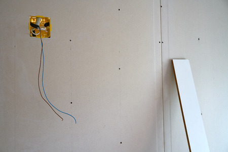 Laminated plasterboard wall construction with electric boxの写真素材
