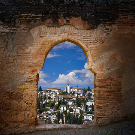 Alhambra arch and Albaicin of Granada photo illustrationの写真素材