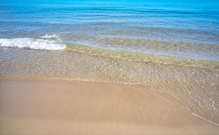 Clear beach water sand in Costa Blanca of Alicante at Spain Mediterranean