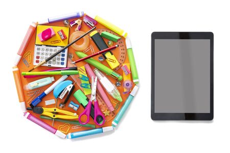 E-learning online learning with tablet PC and school supplies isolated on whiteの写真素材