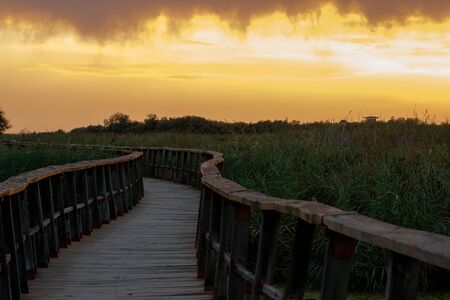 Orange sunset in one of the lagoons of the natural park of the tablesの写真素材