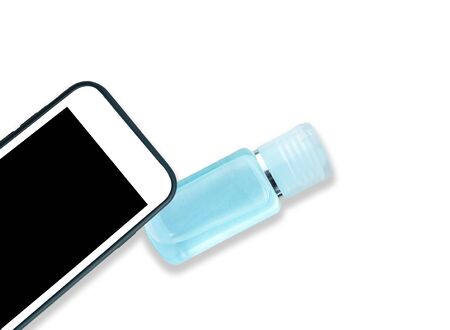 Close-up smartphone and small plastic bottle of sanitizer antibacterial gel, smartphone sanitizer...