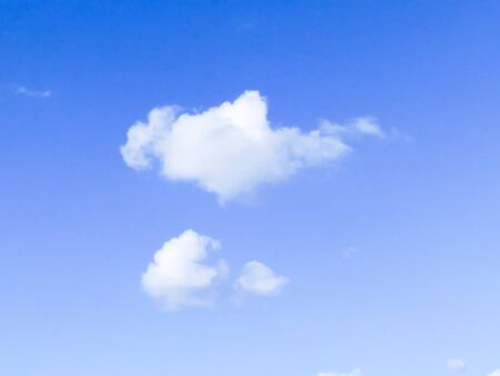 Beautiful white fluffy clouds in the blue sky.