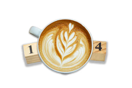 a heart pattern late-art coffee in a white clean cup on white background,white cups of tasty cappucino and valentine letter with heart. Top view.の写真素材