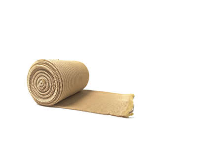 Medical gauze roll and bandage roll on white background.の写真素材