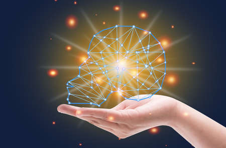 Close up The hand touches or holds the brain and invention, technological innovation in science...