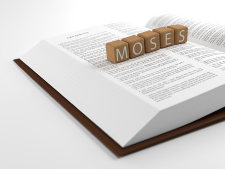 Moses and the Bible - The word moses layed on the bible.の写真素材