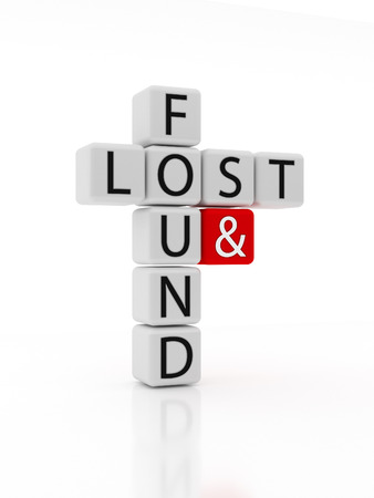 Lost and Found Puzzle - Dice containing the text lost and found crossed. Isolated on a white background.の写真素材