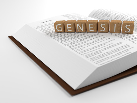 Genesis and the Bible - The word genesis layed on top of the Bible.の写真素材
