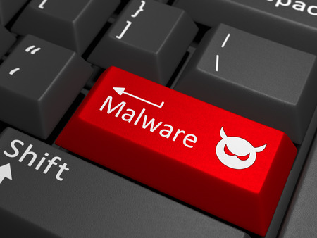 Malware key on keyboard - A red key with the text malware on a black keyboard combined with a threat sign.の写真素材