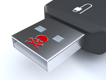 USB malware - An USB-stick infected with malware. The stick contains a skull.の写真素材
