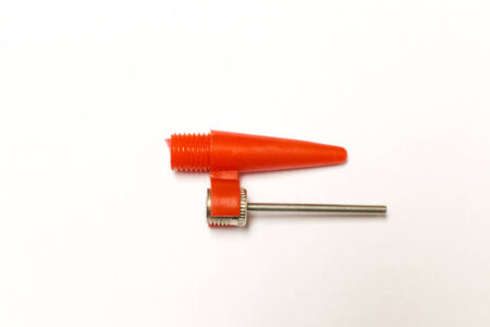 Bladder and ball hand pump isolated over a white background