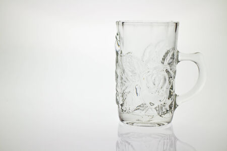 Glass cup  with handle on white backgroundの写真素材