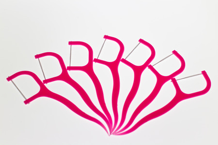Floss Toothpick on white background