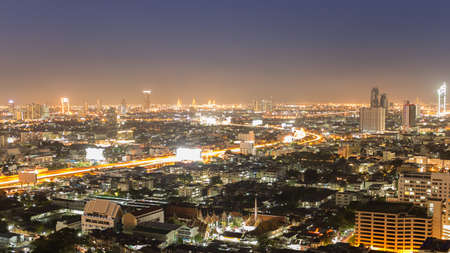 View of Bangkok thailand, in view of the city at night and light from the street.