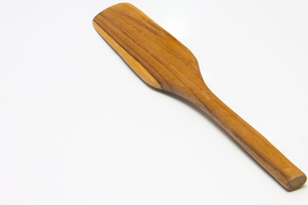 wooden spatula isolated on white background closeupの写真素材