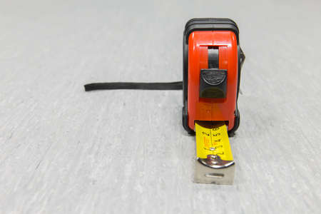 Red and black tape measure.の写真素材