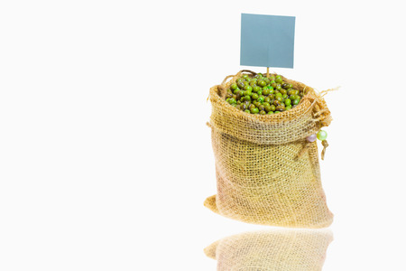Green beans in a sack and label ,On white background.の写真素材