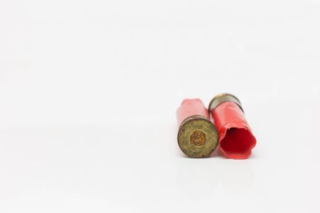 Red shotgun shell used.On white background.
