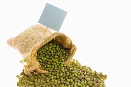 Green beans in a sack and label ,On white background.の写真素材
