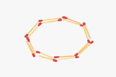 letter O made of safety match isolated on white backgroundの写真素材