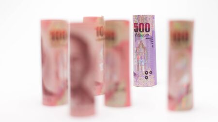 Thailand banknotes stacked by value.Rolls Thai banknotes.Thai currency money.Banknotes stacked on...