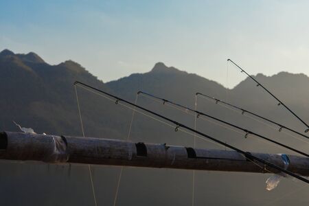 Fishing rods leaning on bamboo.の写真素材