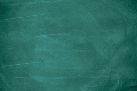 Texture of chalk rubbed out on blackboard or chalkboard background. School education, dark wall backdrop or learning concept.の写真素材