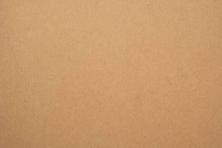 Texture of brown craft or kraft paper background, cardboard sheet, recycle paper, copy space for text.の写真素材