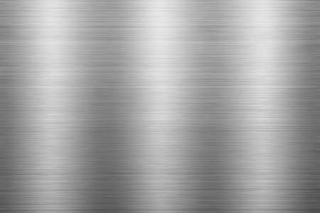Silver metal texture of brushed stainless steel plate with the reflection of light.の写真素材