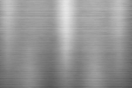 Silver metal texture of brushed stainless steel plate with the reflection of light.の写真素材