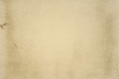Aged texture of old vintage paper, can be use as abstract background, copy space for text.の写真素材