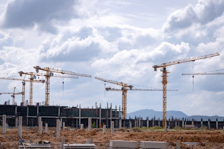 Crane and construction site with building