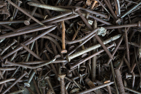 Background of the old rusty nails close-up の写真素材