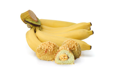 Battered and Deep-Fried Unripe Rice and Grated Coconut Banana Rolls (khaao mao thaawt), Thai sweet dessert isolated on white backgroundの写真素材