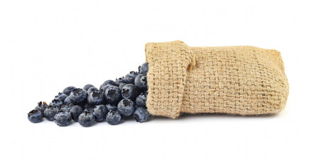 Blueberries in sack isolated on white backgroundの写真素材