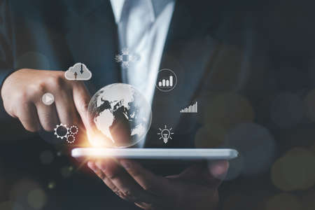 Businessman using mobile smart phone. Business global internet connection application technology and digital marketing, Digital link tech, big data. Financial and banking.の写真素材