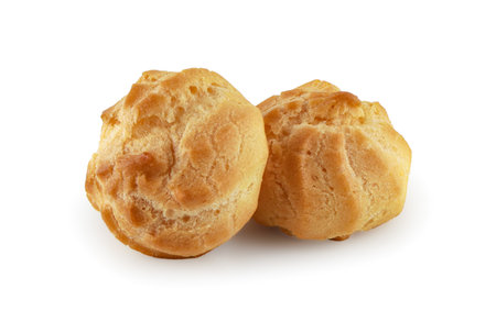 Choux Cream isolated on white background with clipping path, Profiterole, Eclair, Puff pastry ball with creme anglais, Cream puffs, semla, homemade pastry, French dessert.の写真素材
