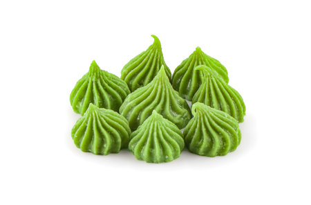 Traditional sweet dessert isolated on white background with clipping path, Thai Ancient Dessert called Alua,Colorful sweet candy made from wheat flour sugar and coconut milk.の写真素材
